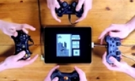 The gamepad can also be a musical instrument!Player staged the handle music big ensemble